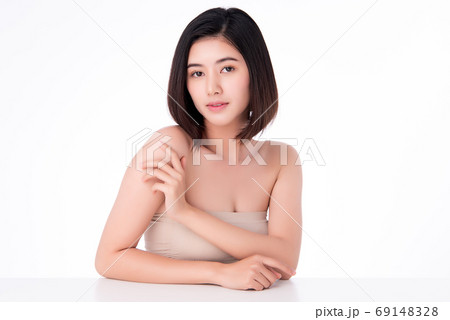 Beautiful Young asian Woman with Clean Fresh Skin, on white background, Face care, Facial treatment. Beautiful Young asian Woman with Clean Fresh Skin, on white background, Face care, Facial treatment. 69148328