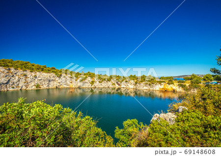 The Zmajevo oko, Dragon's Eye lake at sunny day. 69148608