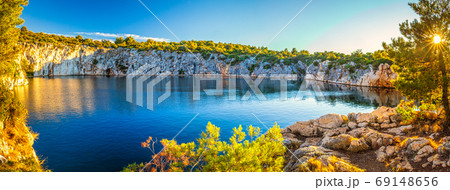 Panoramic view of The Zmajevo oko, Dragon's Eye lake at sunset. 69148656