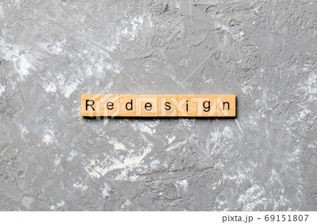 REDESIGN word made with wooden blocks concept 69151807