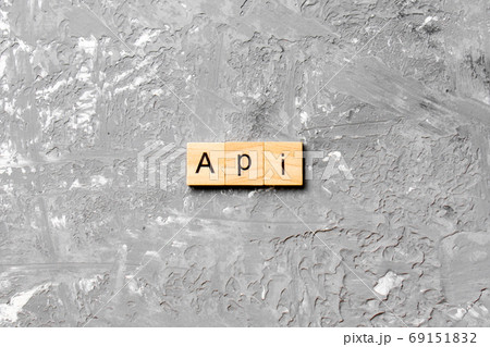API word written on wood block. application program interface text on table, concept 69151832