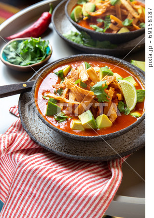 Aztec soup. Close up of mexican tortilla soup Sopa Azteca 69158187
