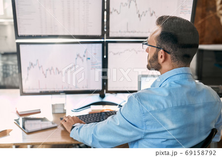 Businessman analyzing global bitcoin price on network diagram Businessman analyzing global bitcoin price on network diagram 69158792