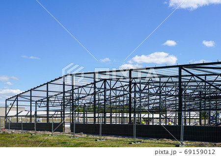 construction of a new modern industrial building, metal truss frame construction of a new modern industrial building, metal truss frame 69159012