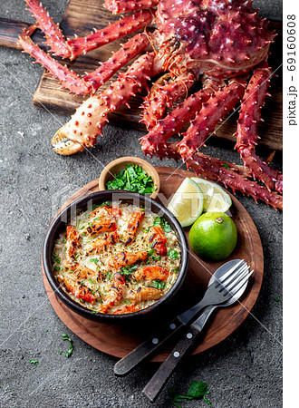 Chilean food. Baked crabmeat crab meat with cheese, cream and bread. Pastel o chupe de sentolla or king crab 69160608