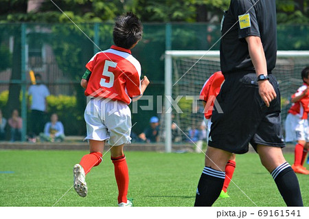 少年サッカーでの得点後のガッツポーズの写真素材