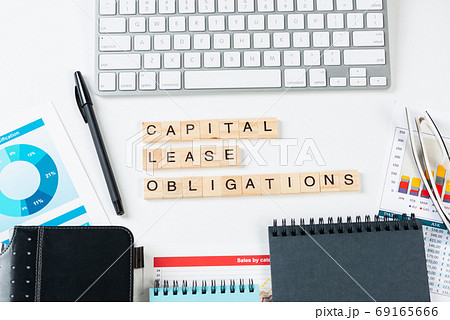 Capital lease obligations concept with letters Capital lease obligations concept with letters 69165666