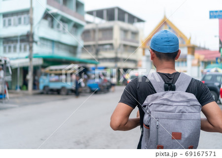 Man travel around the world with backpack freedom and relax life. Man travel around the world with backpack freedom and relax life. 69167571