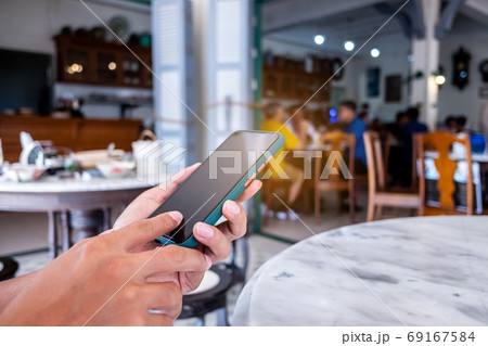 Man hand using smartphone to do work business, social network, communication. Man hand using smartphone to do work business, social network, communication. 69167584