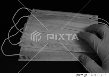 Medical mask and protected blue gloves. Medical protective shielding bandage. Coronavirus. 69169727