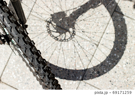 Bicycle wheel and tyre part grunge background Bicycle wheel and tyre part grunge background 69171259