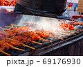 grilled chicken skewer sticks on the bbq grill outdoor 69176930