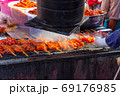 grilled chicken skewer sticks on the bbq grill outdoor 69176985