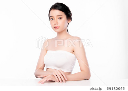 Beautiful Young asian Woman with Clean Fresh Skin, on white background, Face care, Facial treatment. 69180066
