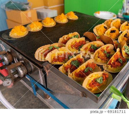 Thai Crispy Pancakes in street food concept Thai Crispy Pancakes in street food concept 69181711
