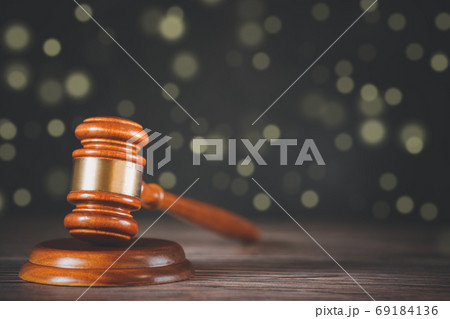 Old wood Judge hammer with law book on the white background, Old wood Judge hammer with law book on the white background, 69184136