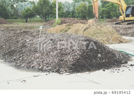 organic compost heap. fertilizer production for soil cultivation 69195412