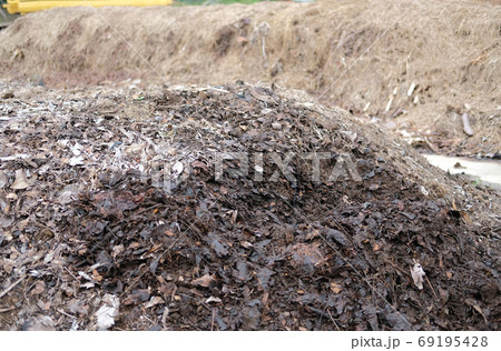 organic compost heap. fertilizer production for soil cultivation organic compost heap. fertilizer production for soil cultivation 69195428