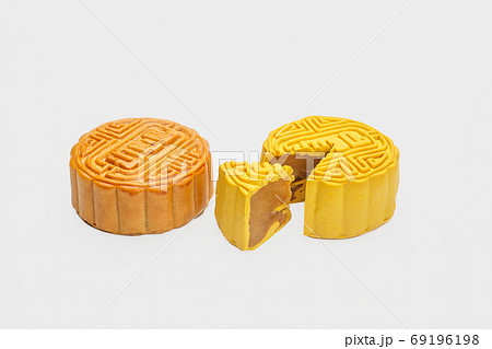Traditional mooncake with durian and nuts filling on white backg 69196198