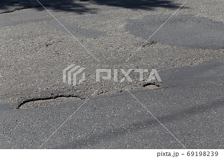 asphalt damaged road 69198239