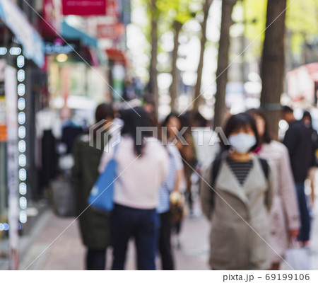Blur Asian People wear mask walking on city street Corona virus outbreak Blur Asian People wear mask walking on city street Corona virus outbreak 69199106