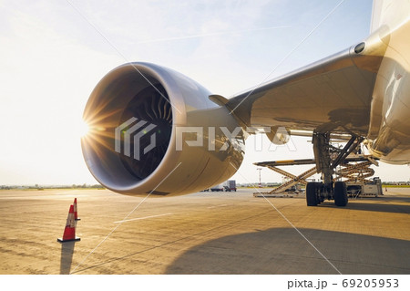 Large jet engine at sunset 69205953