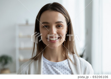 Head shot close up portrait of attractive woman. Head shot close up portrait of attractive woman. 69206106