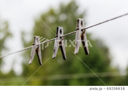 clothespins hanging on a rope clothespins hanging on a rope 69206638