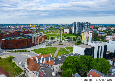 Aerial view of European Solidarity Center and the monument to the Fallen Shipyard Workers of 1970 with three crosses. Tricity, Pomerania, Poland. Aerial view of European Solidarity Center and the monument to the Fallen Shipyard Workers of 1970 with three crosses. Tricity, Pomerania, Poland. 69207380