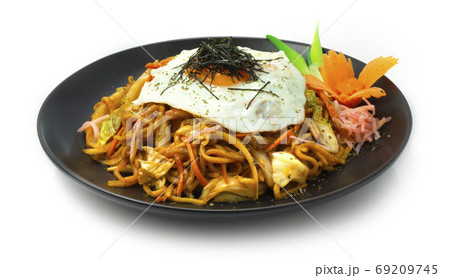 Yakisoba ontop Fried Egg is a classic Japanese stir fried noodle Yakisoba ontop Fried Egg is a classic Japanese stir fried noodle 69209745