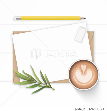 Flat lay top view elegant white composition paper kraft envelope Flat lay top view elegant white composition paper kraft envelope 69211371