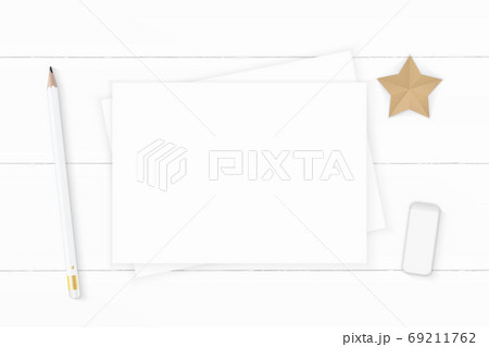Flat lay top view elegant white composition paper pencil eraser Flat lay top view elegant white composition paper pencil eraser 69211762
