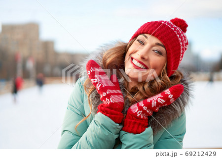 Woman on Christmas fair  69212429