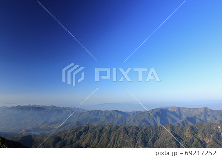Landscape mist-covered mountains in the morning. 69217252