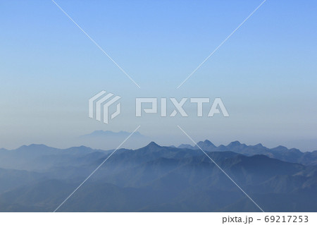 Landscape mist-covered mountains in the morning. Landscape mist-covered mountains in the morning. 69217253