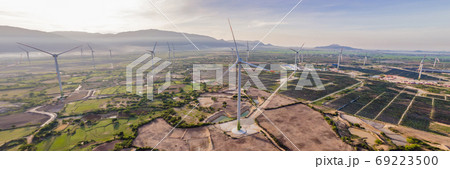 solar energy panels and wind turbine. Drone view BANNER, LONG FORMAT 69223500