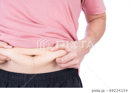 Fat man holding excessive fat belly, overweight fatty belly isolated on over white background. Fat man holding excessive fat belly, overweight fatty belly isolated on over white background. 69224154
