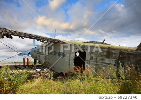 Old-fashioned crashed and abandoned small propeller plane. Airpl 69227340