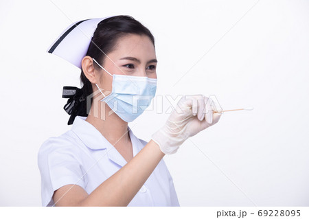 Nurse White uniform with Protective Face mask hold Cotton Bud Nurse White uniform with Protective Face mask hold Cotton Bud 69228095
