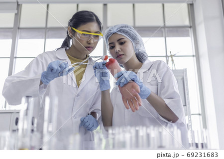 asian woman's students nurse intern medical cleaning. 69231683