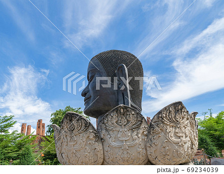 The Black buddha head or Rahu in a temple in Phra Nakhon Si Ayut The Black buddha head or Rahu in a temple in Phra Nakhon Si Ayut 69234039