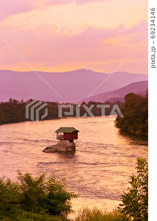 House on rock island in river Drina - Serbia 69234146