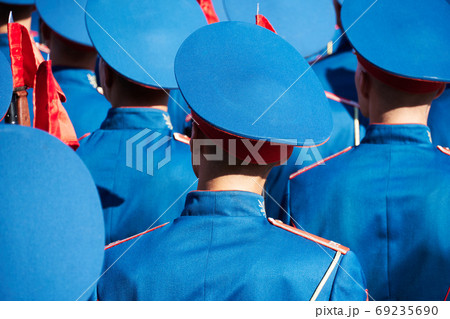 military parade in a city, soldiers in full dress uniforms ordered in parade formation military parade in a city, soldiers in full dress uniforms ordered in parade formation 69235690