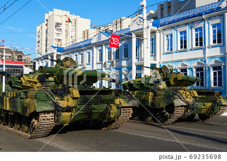 military parade in the city, ordered military equipment, tanks, guns and other weapons in the street for celebration 69235698