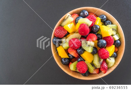 mixed fresh fruits (strawberry, raspberry, blueberry, kiwi, mang 69236555