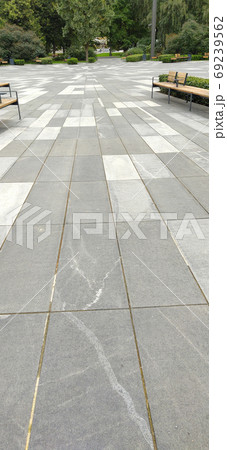 Tiled square in the city park in summer day 69239562