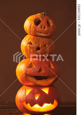 Four Jack O' Lantern Pumpkins Four Jack O' Lantern Pumpkins 69239892