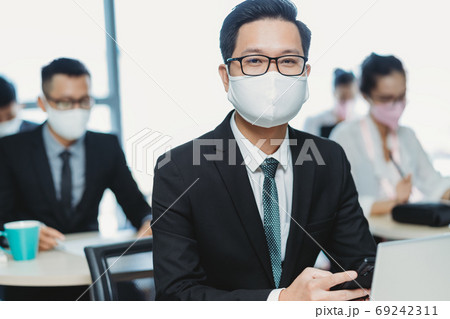 People working in new normal, after pandemic People working in new normal, after pandemic 69242311