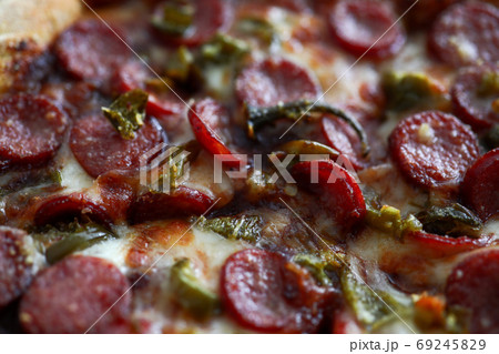 Fresh baked pizza with crusty cheese and hot tasty pepperoni ready to eat 69245829