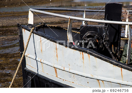 The Bow of an Old Fishing Boat in a Scottish Harbour The Bow of an Old Fishing Boat in a Scottish Harbour 69246756